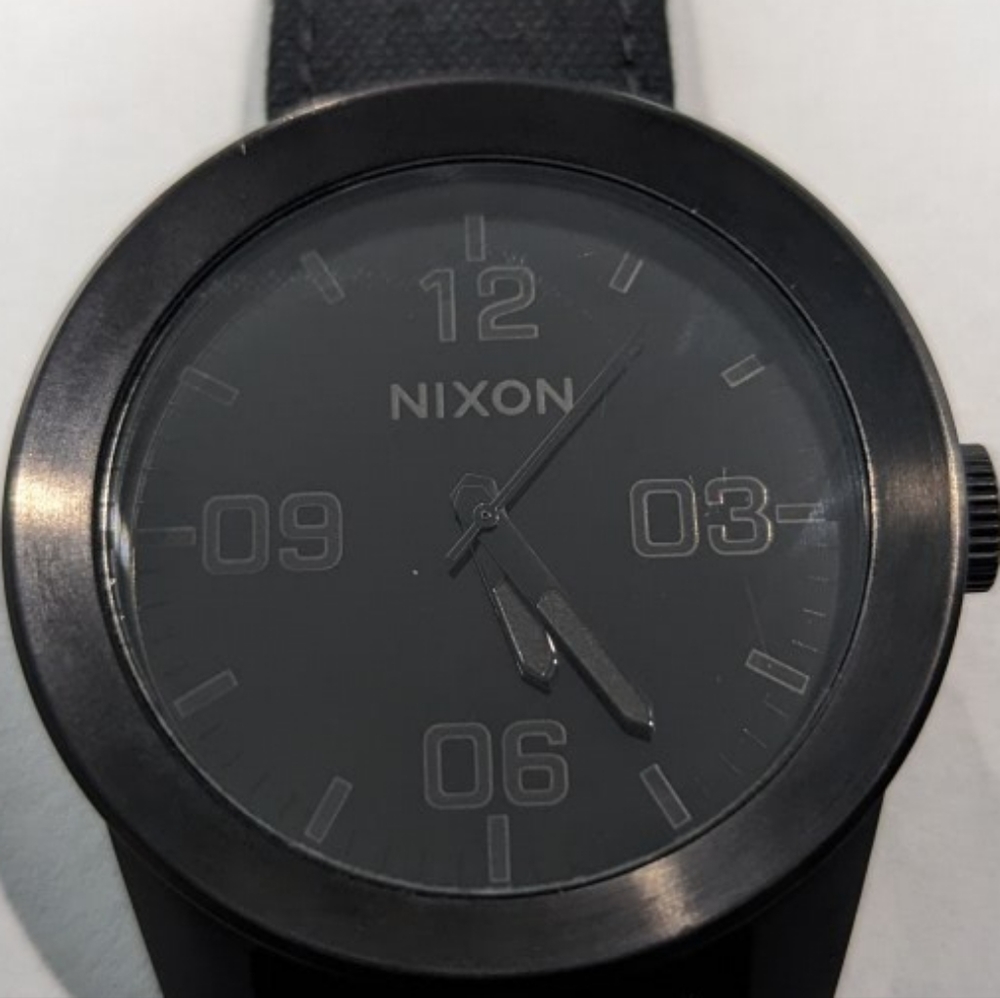 A rare all black, Nixon, The Corporal watch & special Nixon / Horween band.